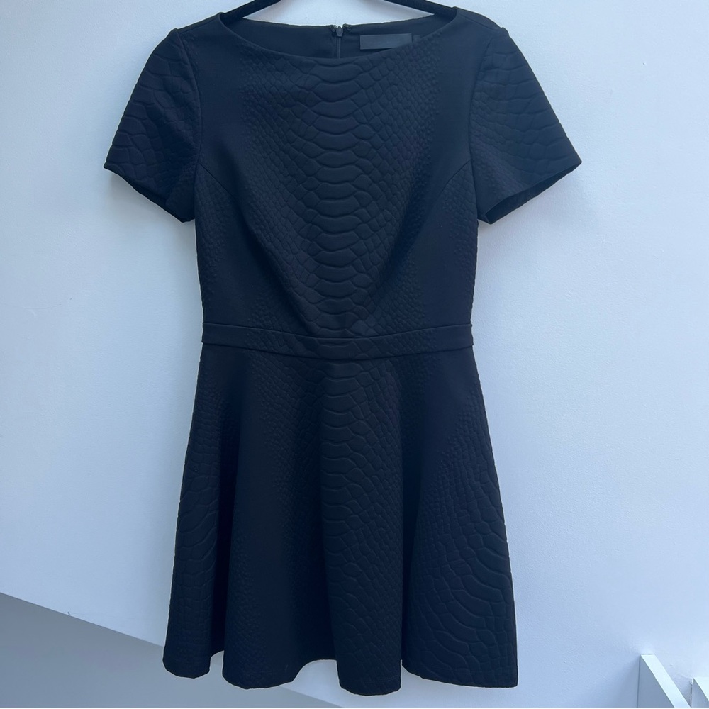 Sally LaPointe sz 4 structured black mini dress w/ embossed snake skin pattern
